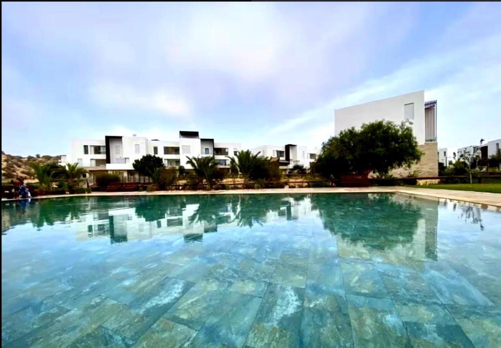 2 minutes de la plage , Résidence Tamourrit, Taghazout Bay , vue mer , golf , piscine, Taghazout