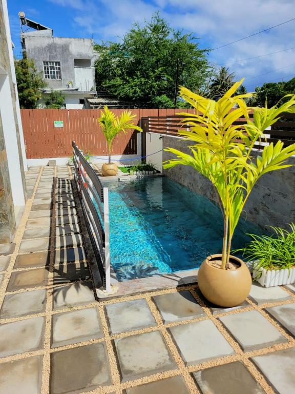 Freesia Apartment by Mau-Rent Houses, Trou-aux-Biches