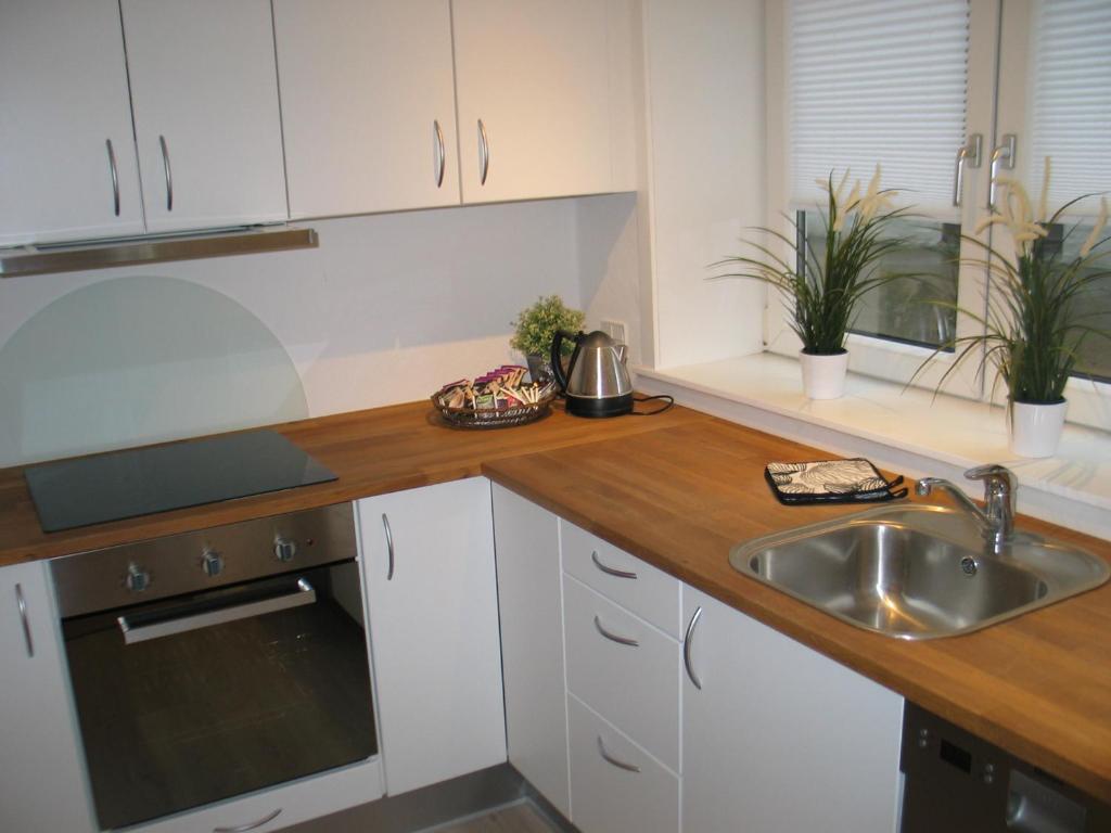Kitchen, Aalborg City Rooms ApS in Nørresundby