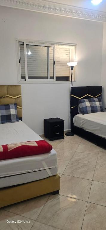 Appartement bleu, As-Sawíra