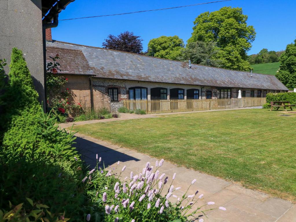 The Old Stables exterior — pet-friendly self-catering cottage in Durweston, Dorset