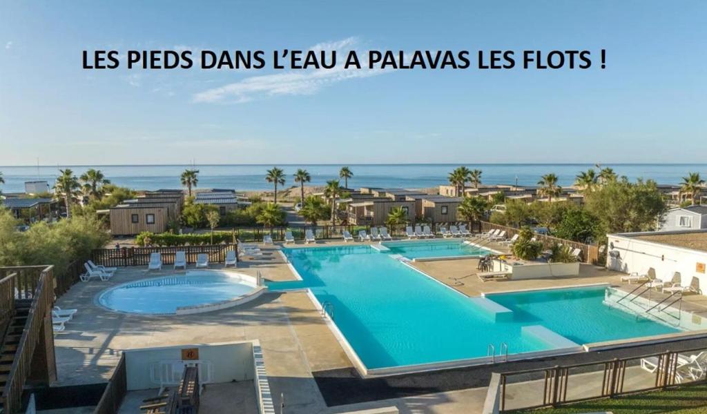 LES PIEDS DANS L'EAU A PALAVAS ! Mer à 50 m ! Espace aquatique ,toboggans, MHome 6 Pers climatisé CAMPING 4 ETOILES - 1
