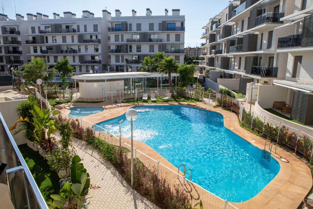 Apartamento Tulipán en Dénia Urb Marina Real III Terraza, varias piscinas y gimnasio cerca de la playa Las Rotas - 1