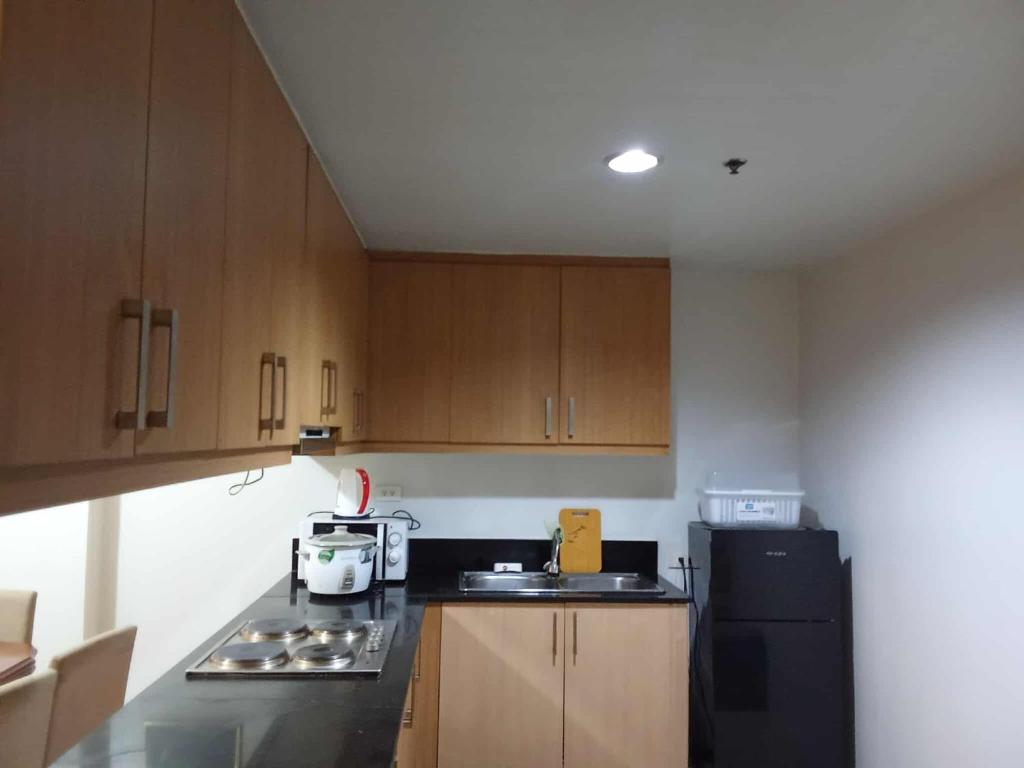 1058-3br-10 beds 1 extra mattress-moa view with balcony, Manila