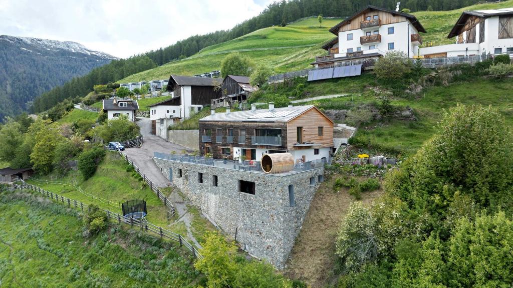 Ansitz Röfen, Burgusio