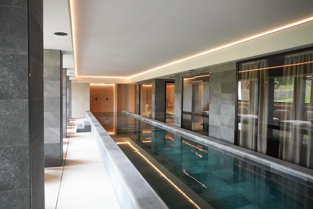 Marins Suites - Adults Only Hotel — Swimming pool in Cala Bona, Balearic Islands