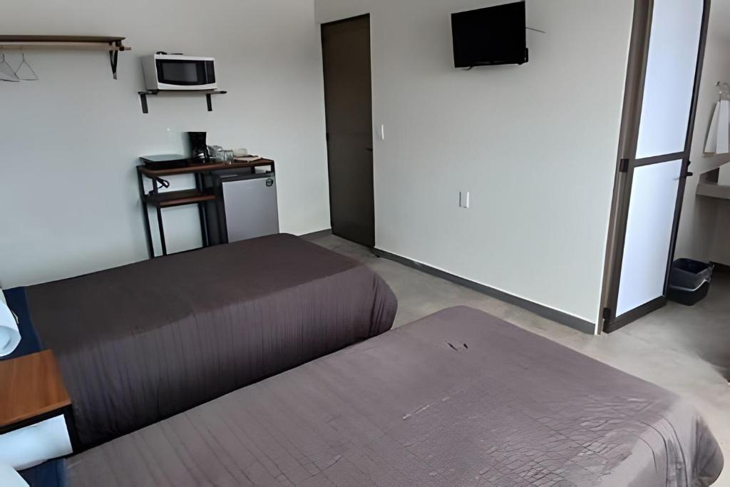 SUITE Clavel, AA, cocineta, baño privado, ubicació, Tepic