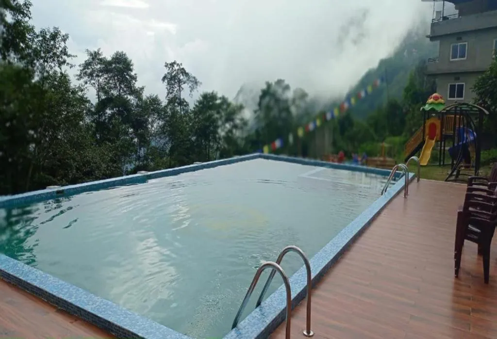 Staynest Z Resort Gangtok - swimming pool #gym #BAR #garden #parking，位于甘托克的酒店
