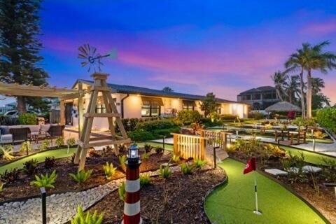 New salt pool & 7 hole mini golf on canal -Vanderbilt Country Club, Naples