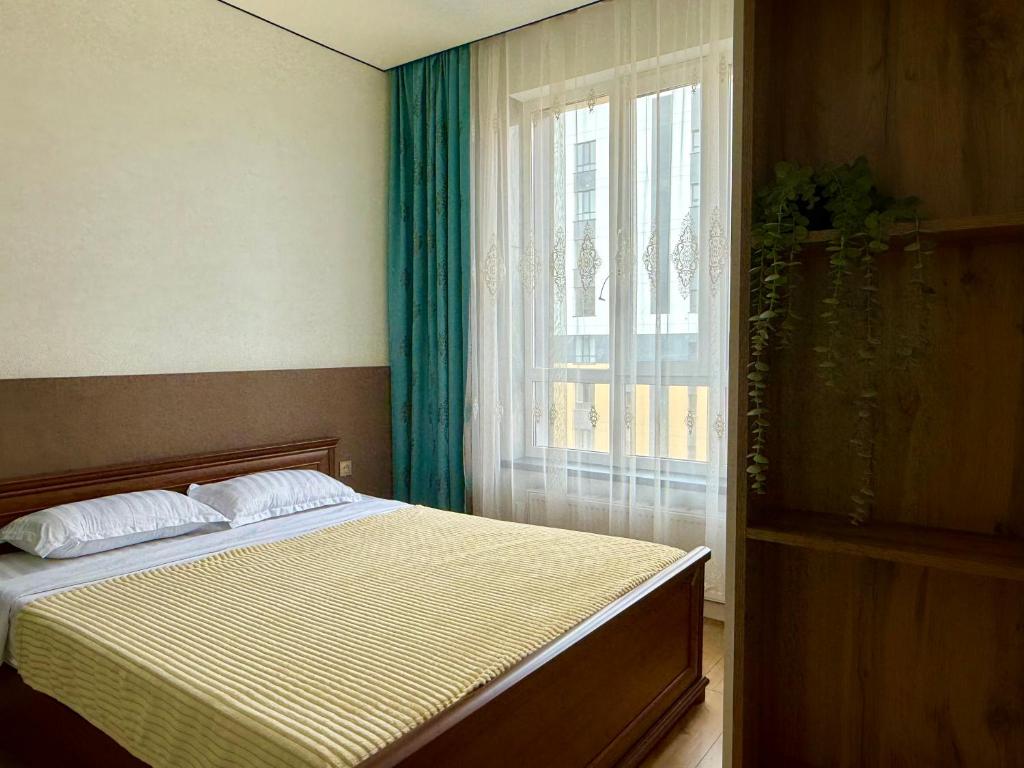 Modern apartment in the city center with 3 rooms studio, Almaty