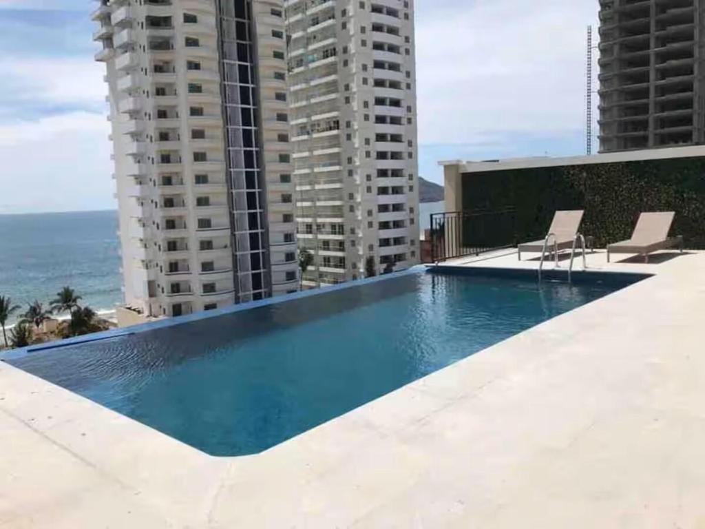Espectacular condo en Blue Marlin Zona Dorada Beach - 1