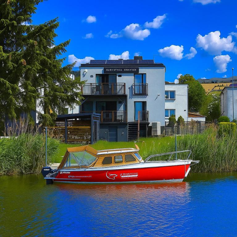 4jeziora - prywatny dostęp do rzeki, pomost, ogrodem, wiata grillowa, rowerek wodny, kajaki w cenie, parking, psiaki dozwolone, Iława