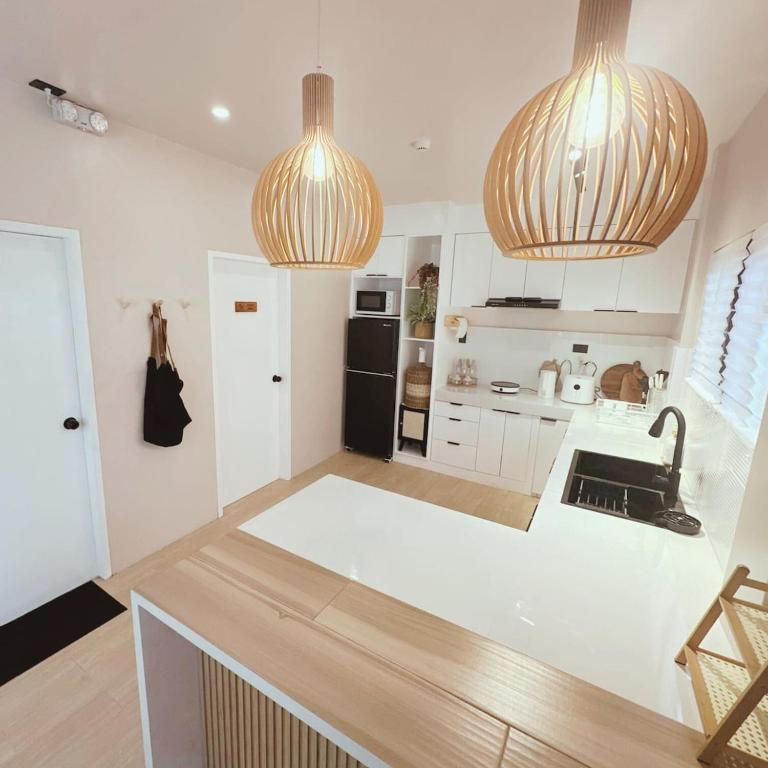 Kitchen, Private 2BR Unit | Netflix, WiFi & Comfort in Mati