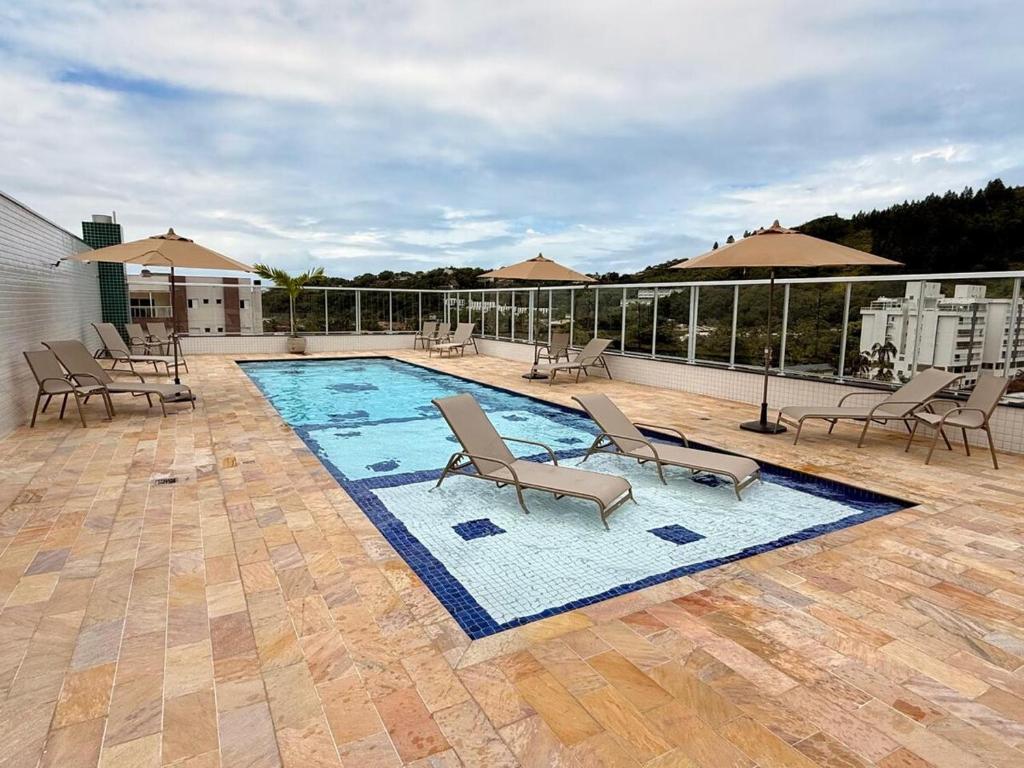 Apt 4min da praia com Ar, Piscina, Sauna e Churrasqueira, Ubatuba