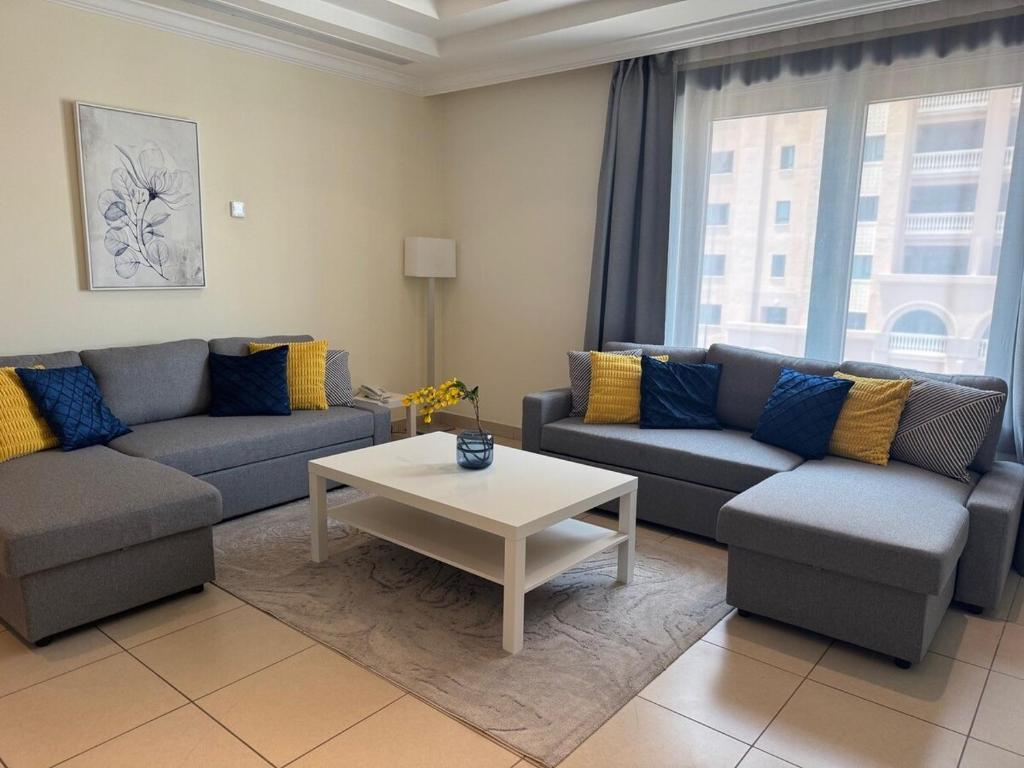 Stylish 1BR Pearl Apt- prime Marina location, Dauhá