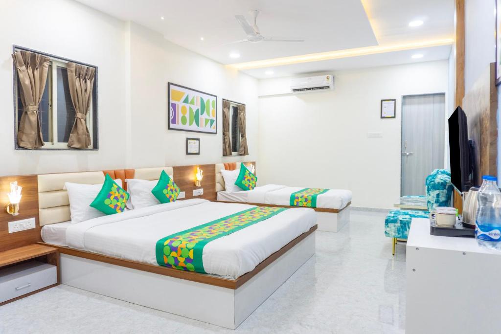 Treebo Aura Inn Regency, Puné