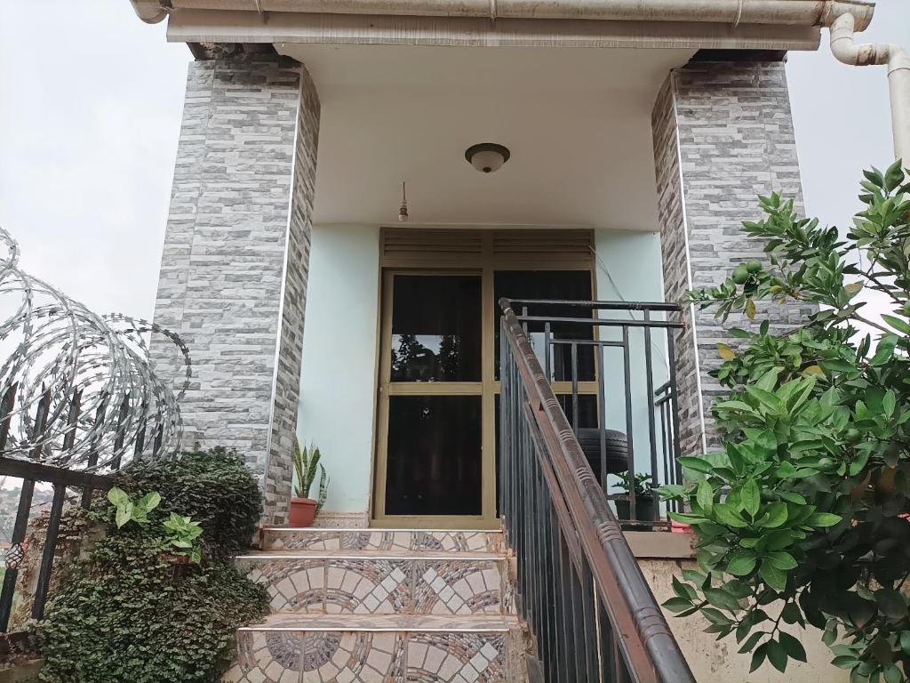 Private room wz full DStv Package, Patio & Kitchenette, Kampala