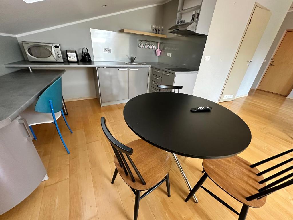 Kitchen, KURESSAARE TALLINN STREET APARTMENTs in Kuressaare