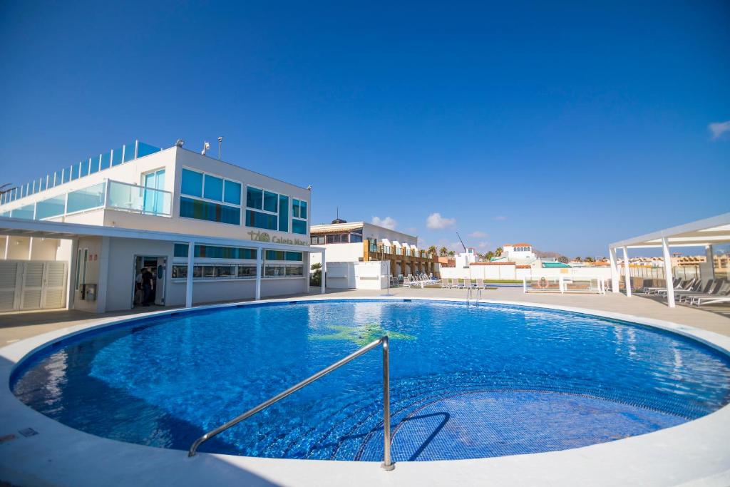 Hotel Boutique TAO Caleta Mar — Swimming pool in Corralejo, Canary Islands