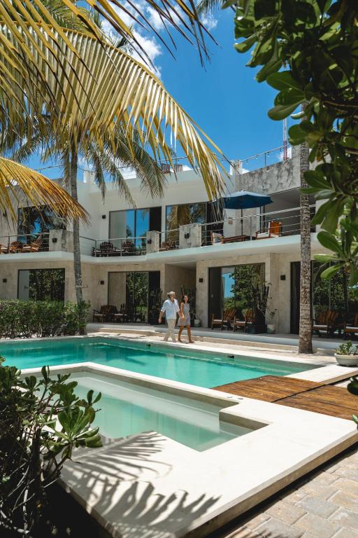 Pool and tropical spaces at Hotel La Casa Cielo in El Cuyo