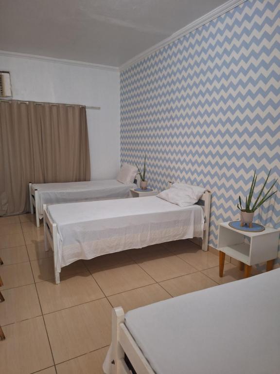 Quarto triplo com banheiro compartilhado, Manaus