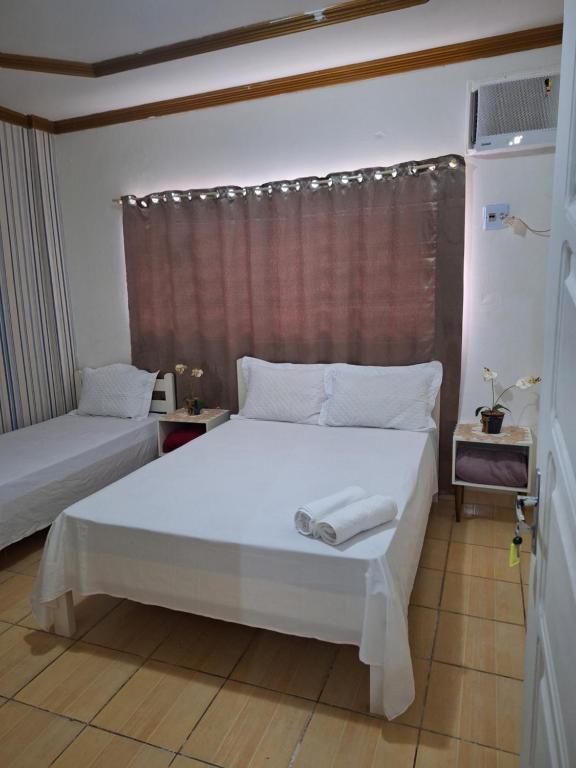 Quarto triplo com banheiro em Pousada e Restaurante, Manaus