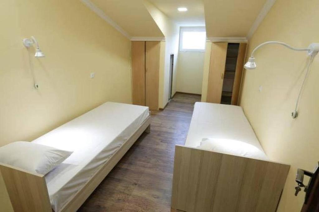 Single Bed in Dormitory Room