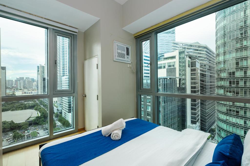 Avant at the Fort BGC 1BR Flr to Ceiling Cor Unit with Great View, Manille