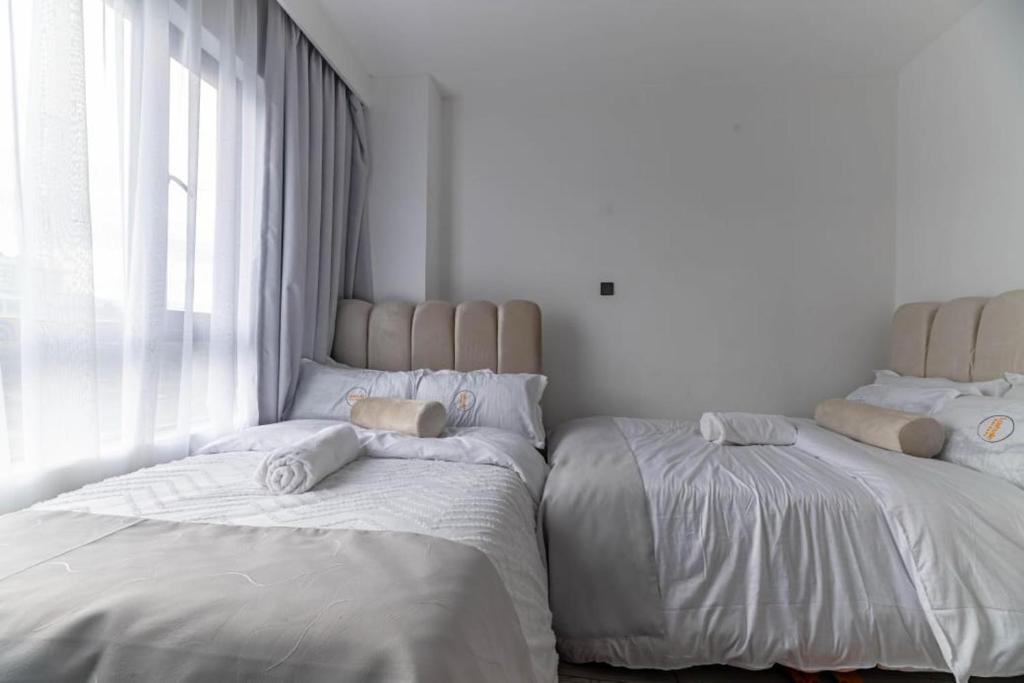 Elegant modern retreat residencies with heated swimming pool ,fully equipped gym and rooftop chillspot with amazing breathtaking city views, Nairobi