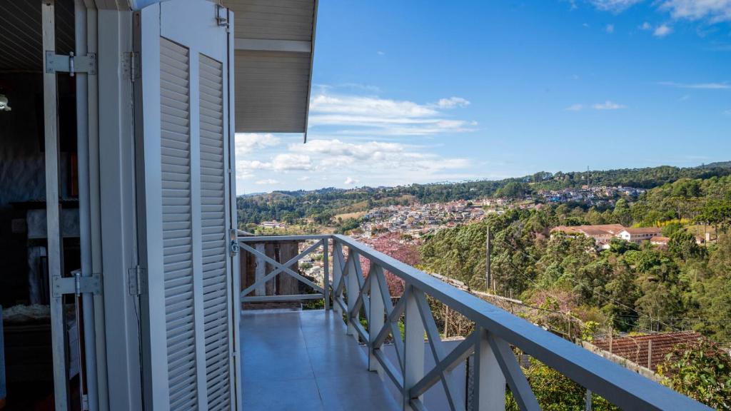 Casa com lareira, Wi-Fi e varanda com vista, Campos do Jordão