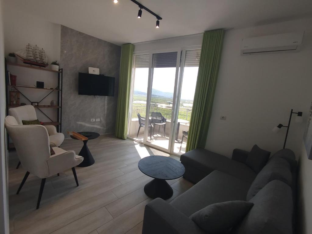 U laguny 404, Shëngjin