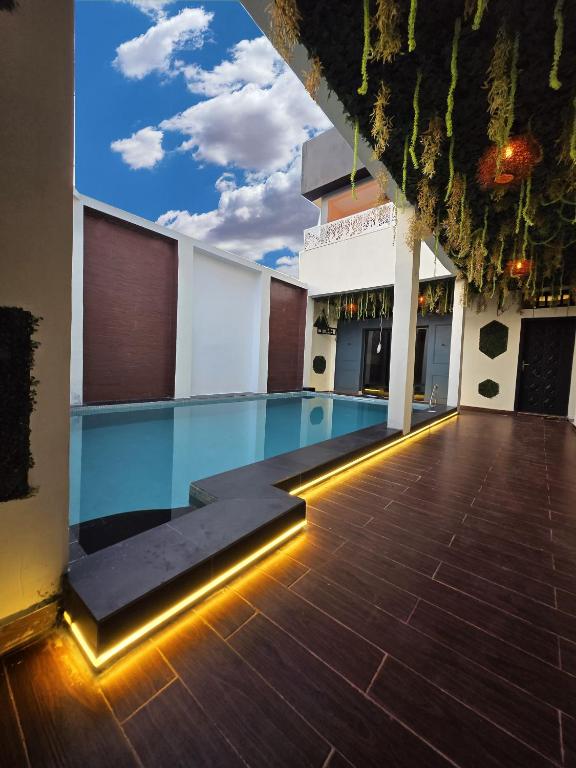 Suna'a home Logpom, Douala