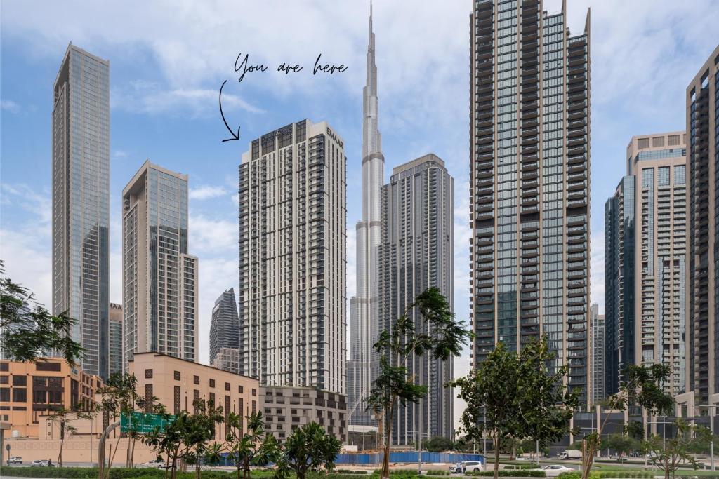Outsdier Vacation Homes - 1BR in the Heart of Downtown Sea View Walk to Burj & Dubai Mall, Dubaï