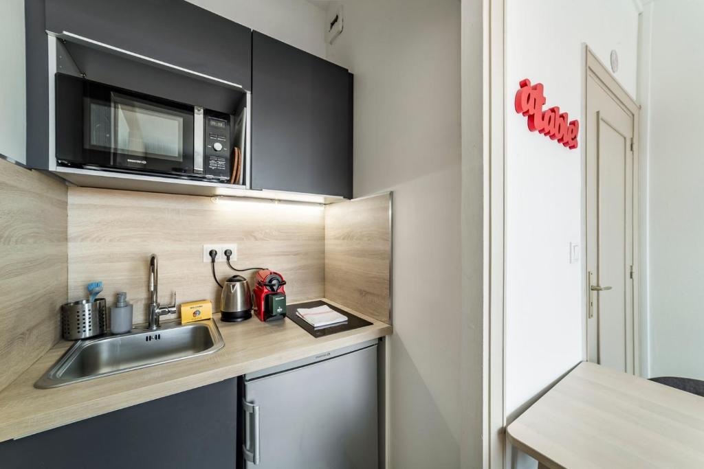 AllinLyon | Studio vue toits Presqu’île - 5