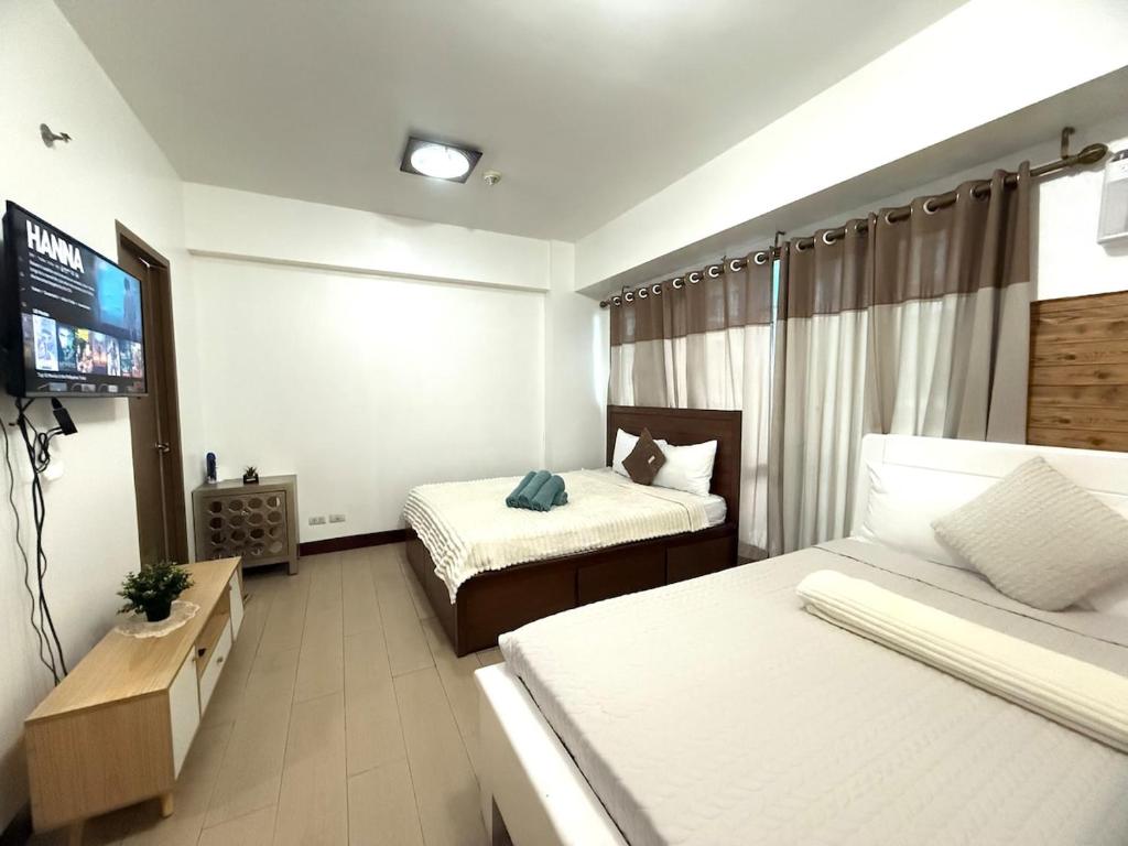 Kyedenz Unit -Two Palm Tree Villas Newport Naia T3, Manille