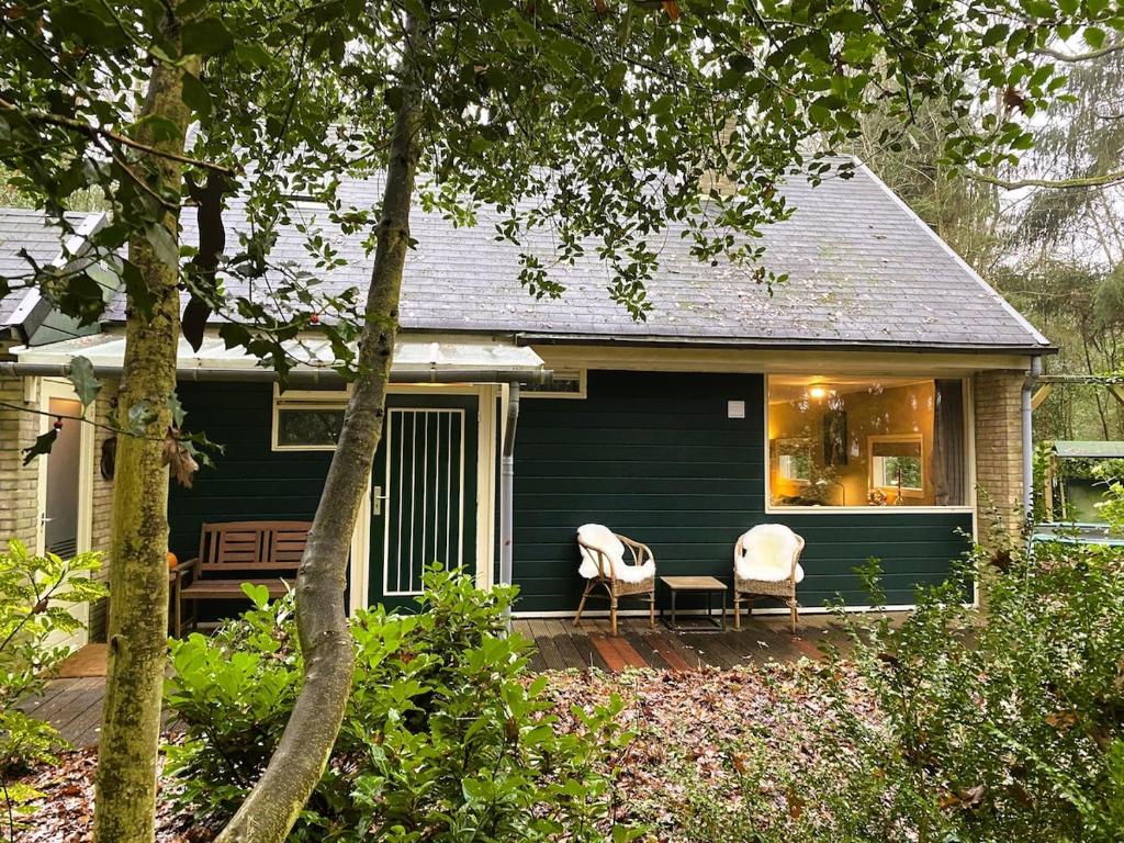 Charming forest house with fairytale forest garden, Wateren