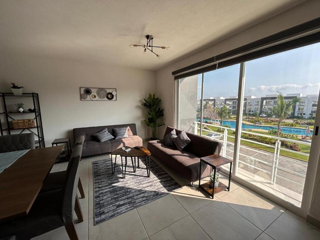Club de Playa, Alberca y Amenidades - Departamento E4 - 1