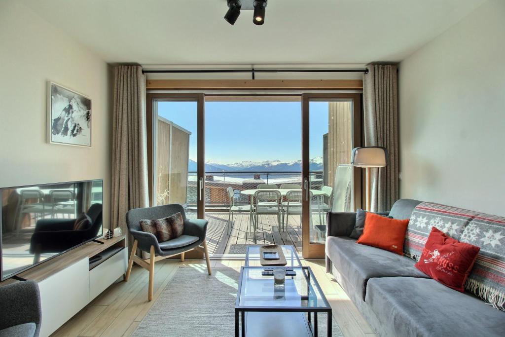 ARC 1600, LE RIDGE, Appartement 06 personnes Duplex Vue Montagne - ski aux pieds - Sauna, Hammam, Piscine, Salle de sport-fitness, Arc 1600