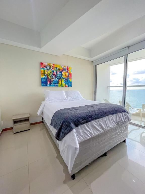 Amanecer frente al mar azul - Descanso 16 - 2