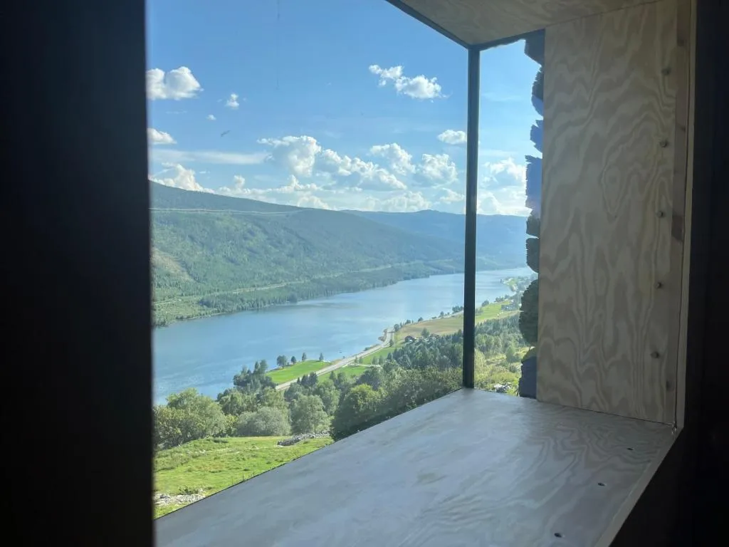 Architect designed sleeping box in barn, hotel in Nos