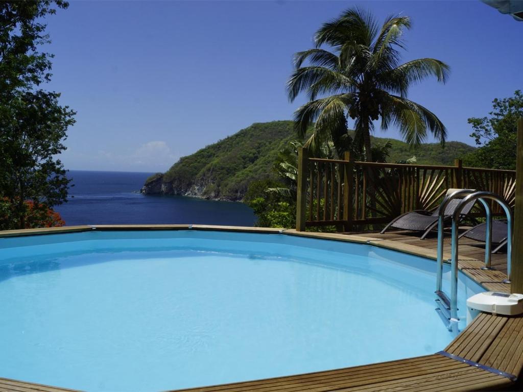 Villa Palma avec vue mer et piscine privée location Domaine de la Pointe Batterie à Deshaies, Deshaies