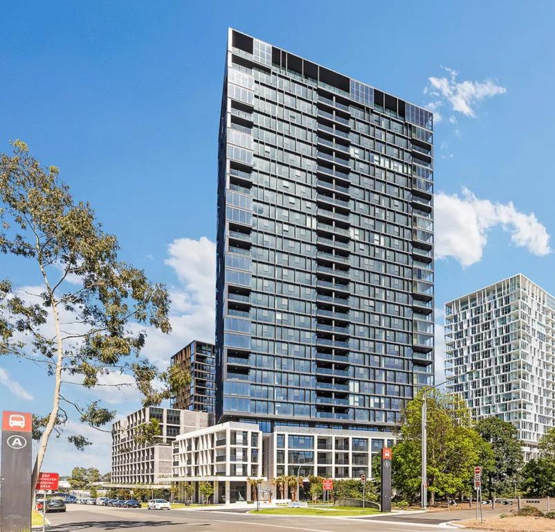 Olympic Park 2BR Pool gym access and walk to stadium, Sydney