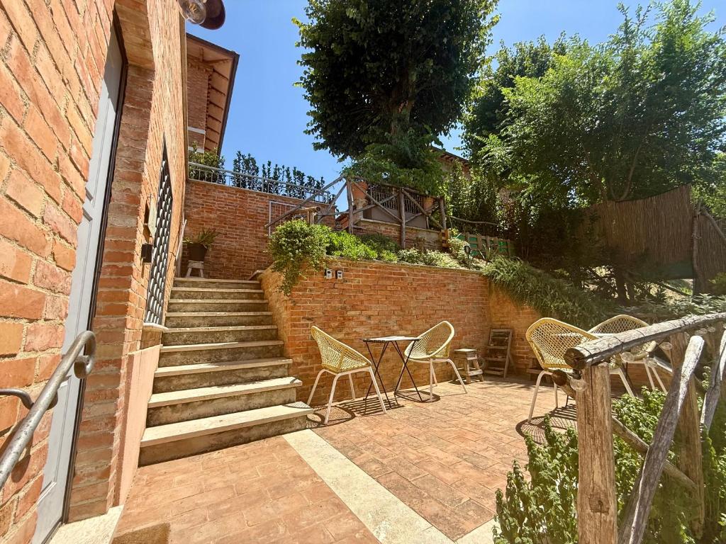 Casale Le Civette의 외관과 주변 정원