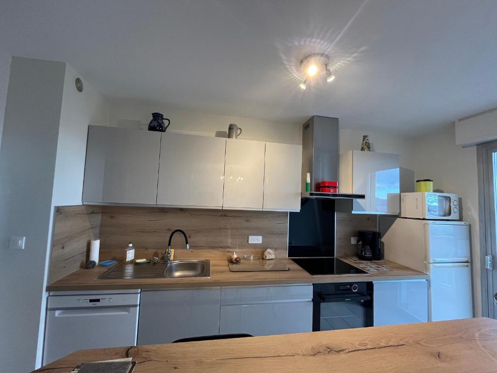 Spacieux appartement refait à neuf avec balcon et garage, proche centre-ville - 2