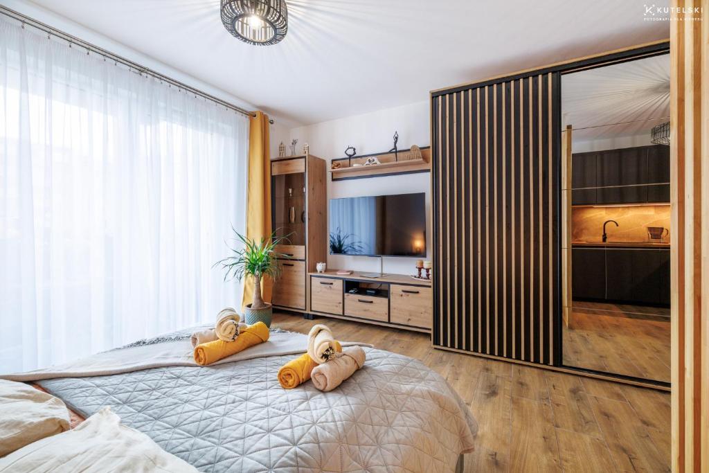 Apartament Jaśmin 깔끔한 침실