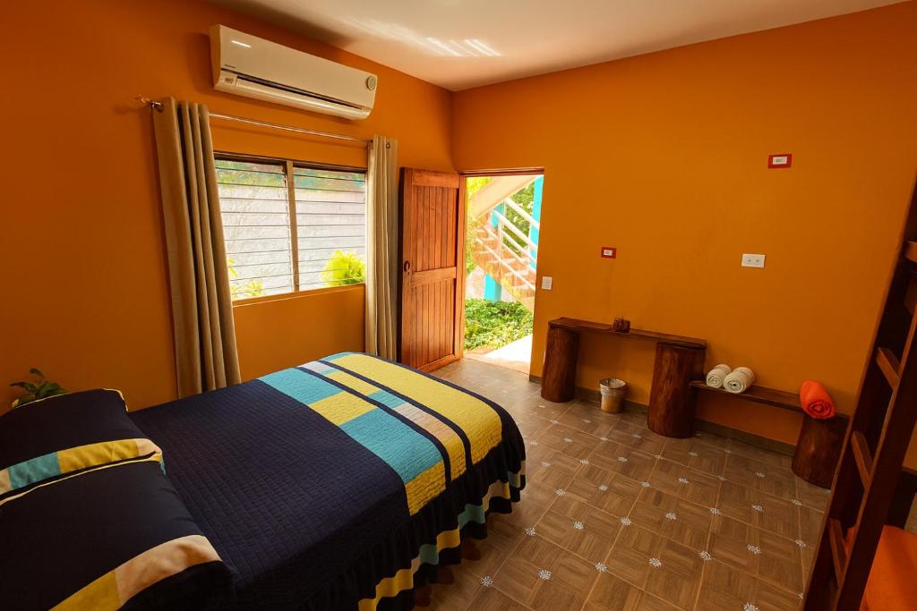Quadruple Room with Private Bathroom, Yaxche Centro Hostal y Camping in Bacalar