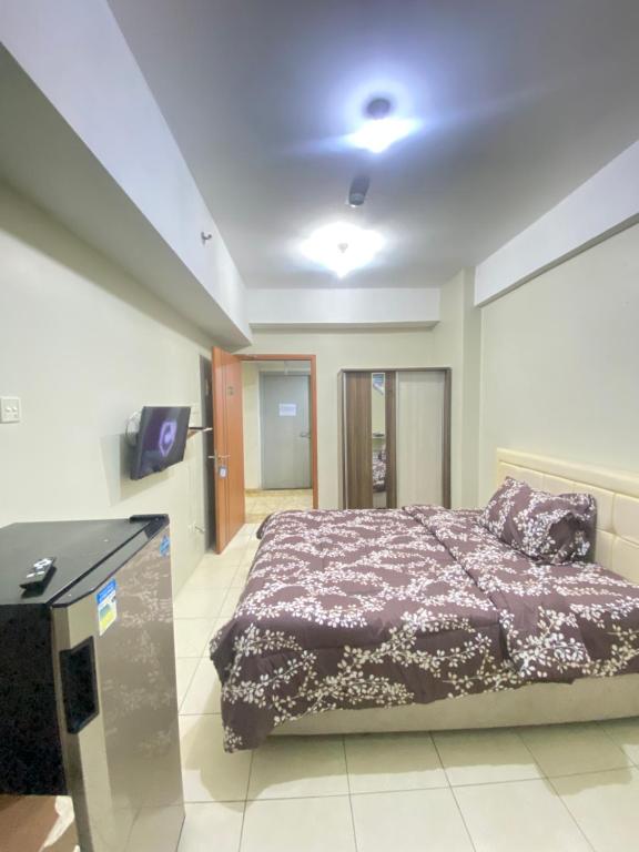 Apartment greenlake view by lens room, Pondokcabe Hilir