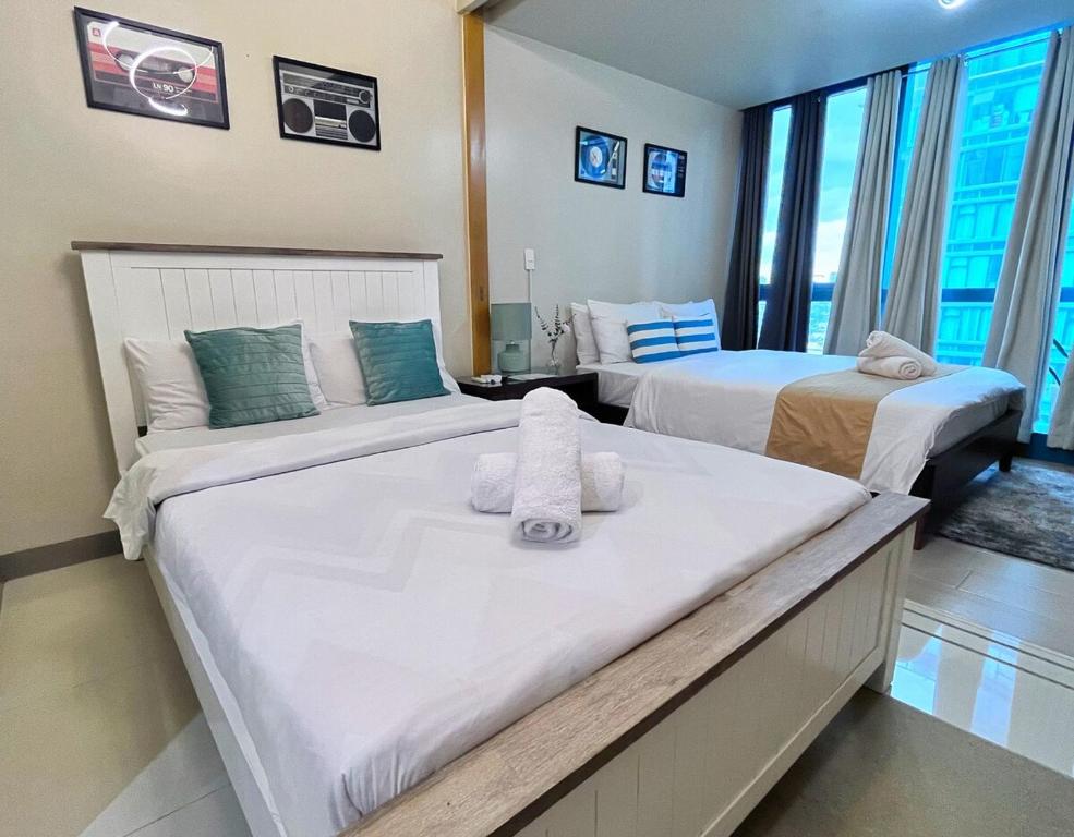 Uptown Mall Linked 1BR 2 Beds Best Value BGC, Manille