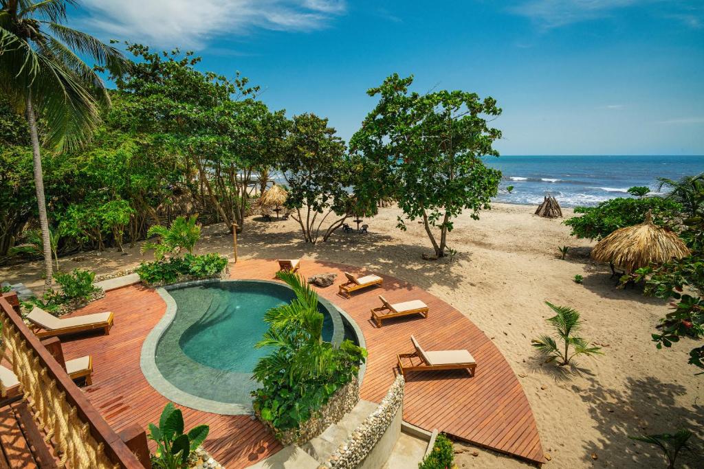 Casa Iwana Tayrona Suites Deluxe Playa y AC - 3