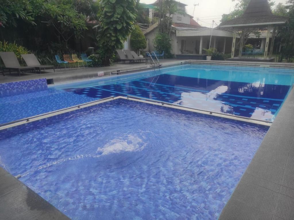 Swimming pool, Hotel Grand Rosela Yogyakarta in Yogyakarta